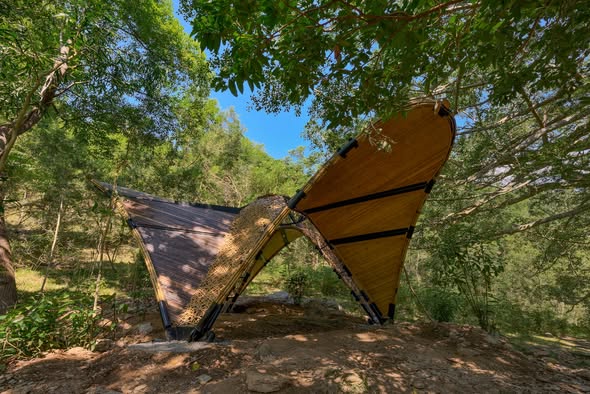 Bamboo Butterfly thin-shell structure standing among trees at Zhiben National Forest Recreation Area, Taitung