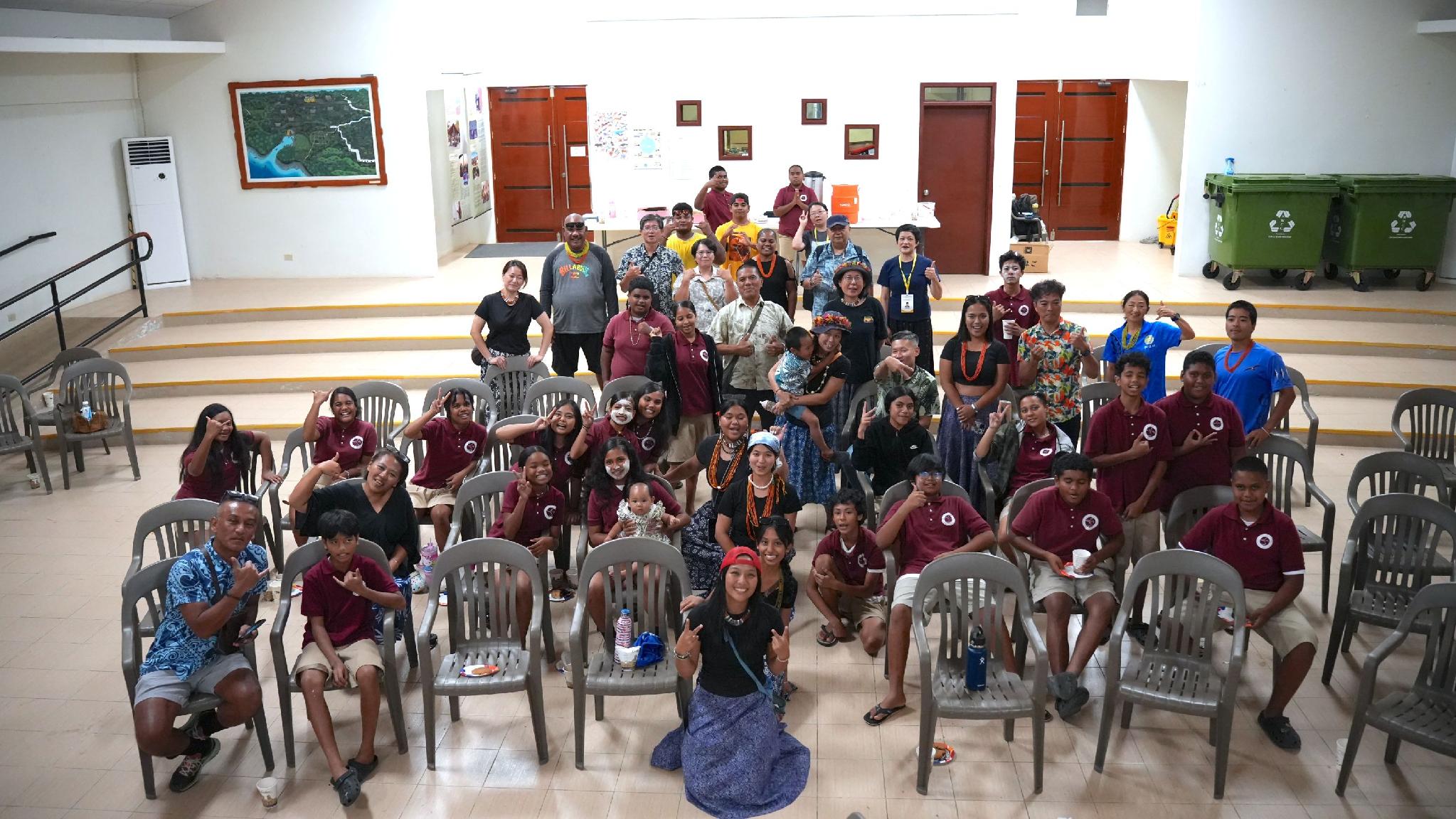 Group photo of Taiwan delegation members and students at Meyuns Elementary School after the Re-connecting Austronesian Ocean Ways workshop, Palau, September 2026