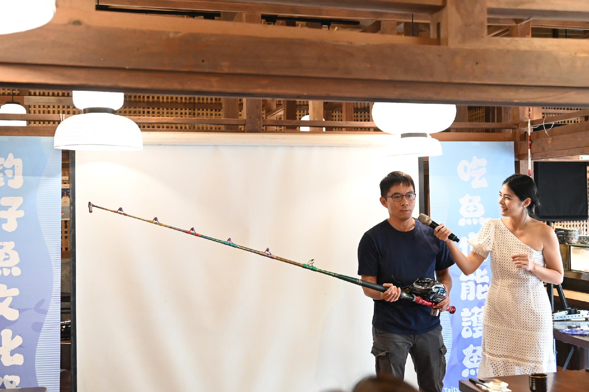 Demonstration of a handline fishing rod and reel at a Taitung fisheries education event in Chenggong