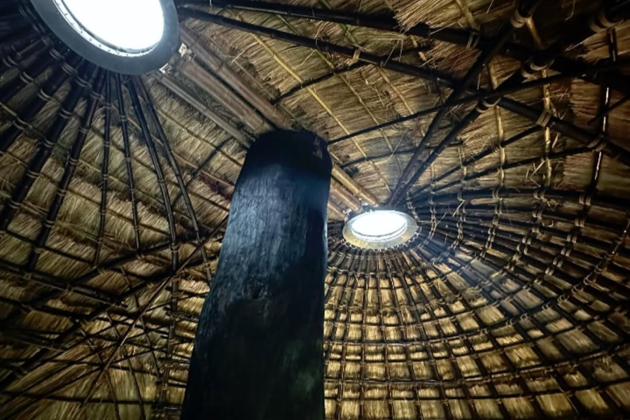 Interior view of the thatched bamboo dome ceiling with skylights, showing its bundled bamboo ring frame, Taitung