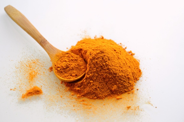 A close-up of turmeric powder
